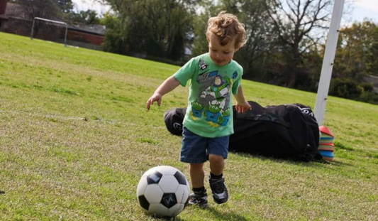 The Trick To Teaching Your Kid to Kick a Soccer Ball